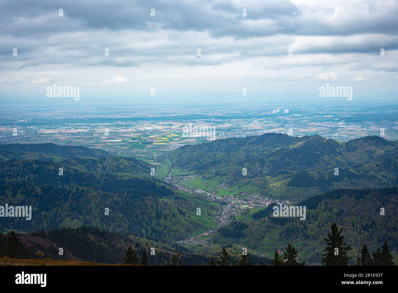 View of part of the Black Forest and Rhine Valley near the border of Germany and France from Mount Belchen, Germany Stock Photo