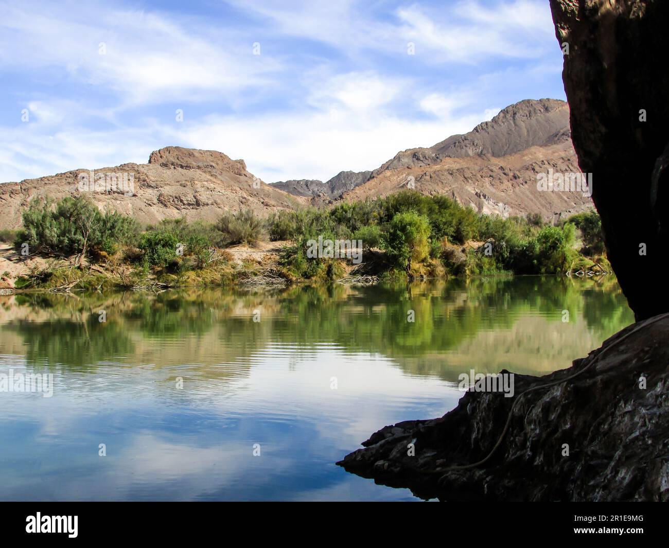 Reflections of the environment of the Richtersveld in the Orange River Stock Photo