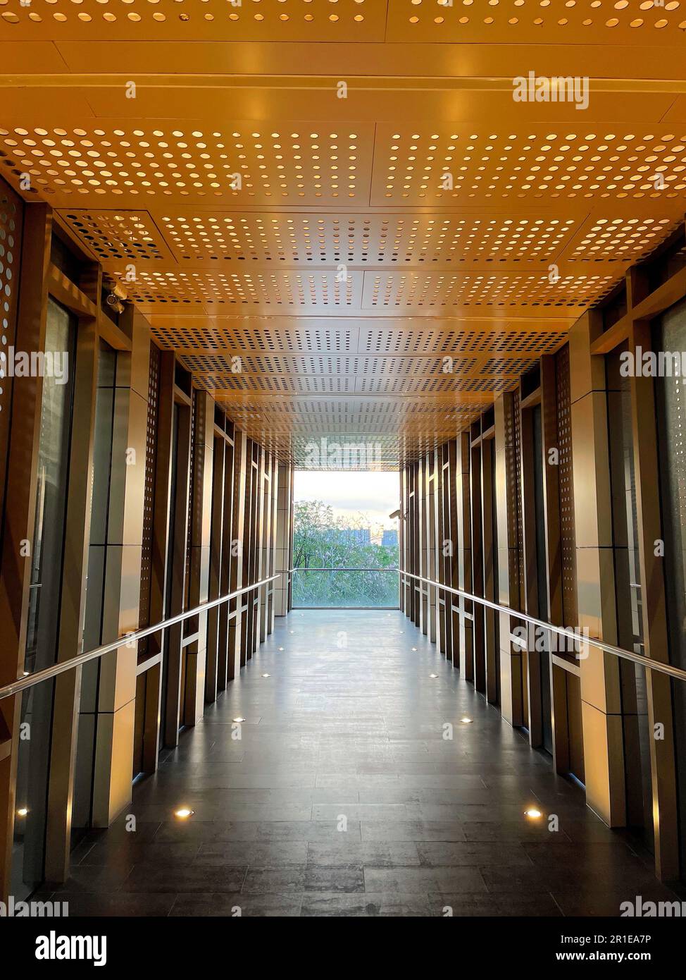 Pedestrian pathway or corridor or hallway between train station and