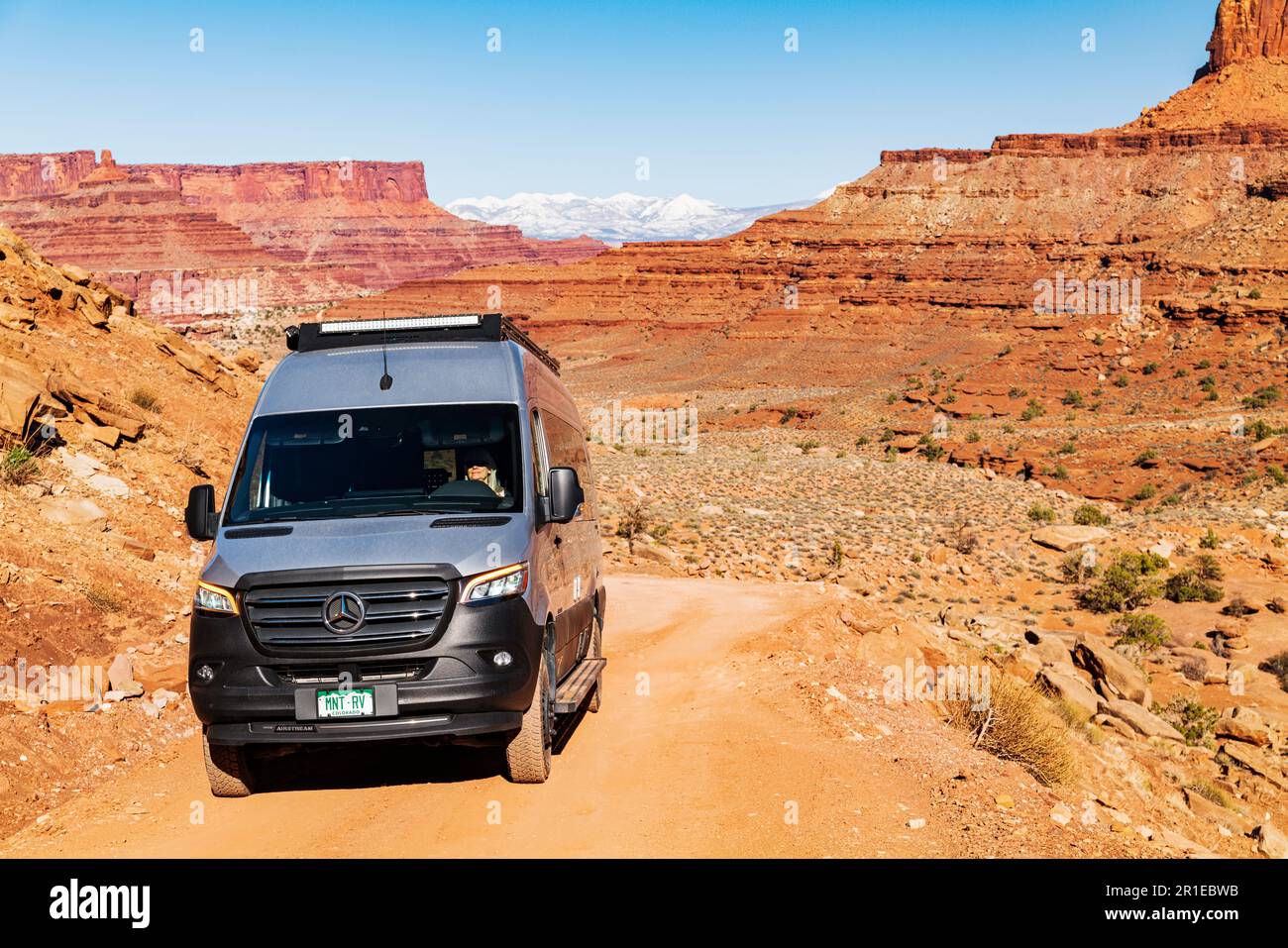 Airstream Interstate 24X 4WD campervan navigating the steep & narrow Shafer Trail Road; Canyonlands National Park; Utah; USA Stock Photo