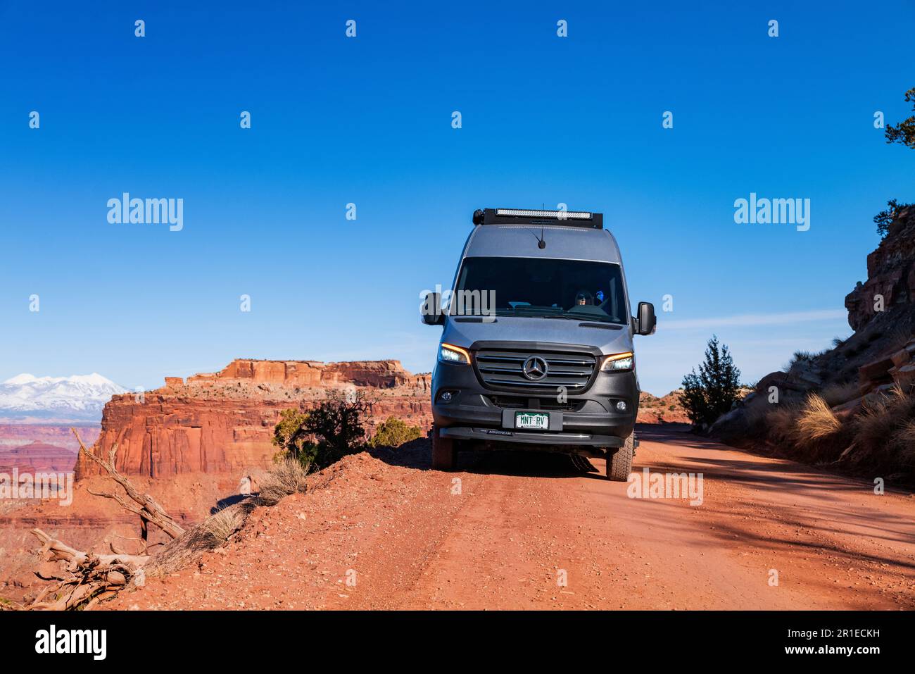 Airstream Interstate 24X 4WD campervan navigating the steep & narrow Shafer Trail Road; Canyonlands National Park; Utah; USA Stock Photo