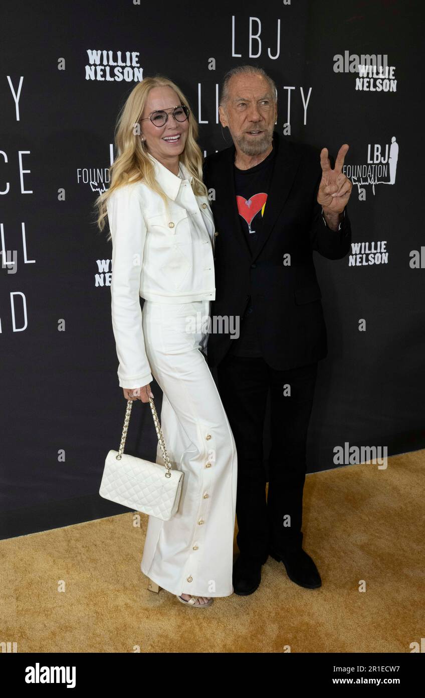 American entrepreneur and billionaire JOHN PAUL DEJORIA and his wife ELOISE pose on the red carpet at the Lyndon Baines Johnson Library's LBJ Liberty Justice For All Award on May 12, 2023. The 2023 award was presented to singer Willie Nelson (not shown) in celebration of his 90th birthday. Stock Photo