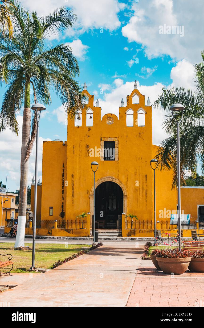 Chapel of Remedies, a bright yellow 16th century Gothic-style Catholic chapel in the town of Izamal, Yucatan, Mexico Stock Photo