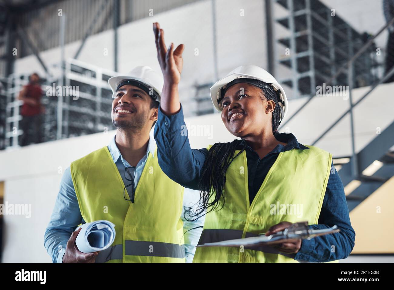 Confident female engineer observing hi-res stock photography and images ...