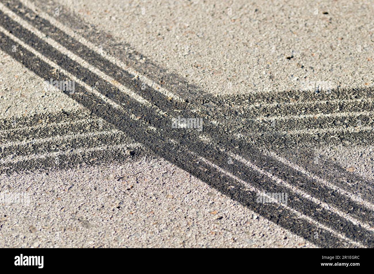 Closeup of several tire skid marks on asphalt Stock Photo Alamy