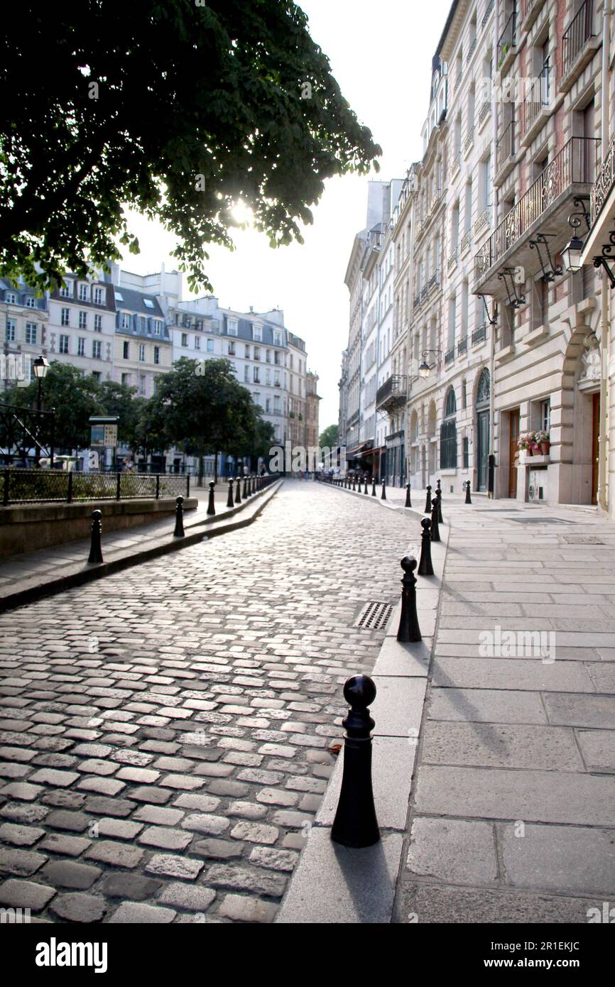 Characteristic pedestrian perspective view of a completely empty characteristic street of Paris. Stock Photo