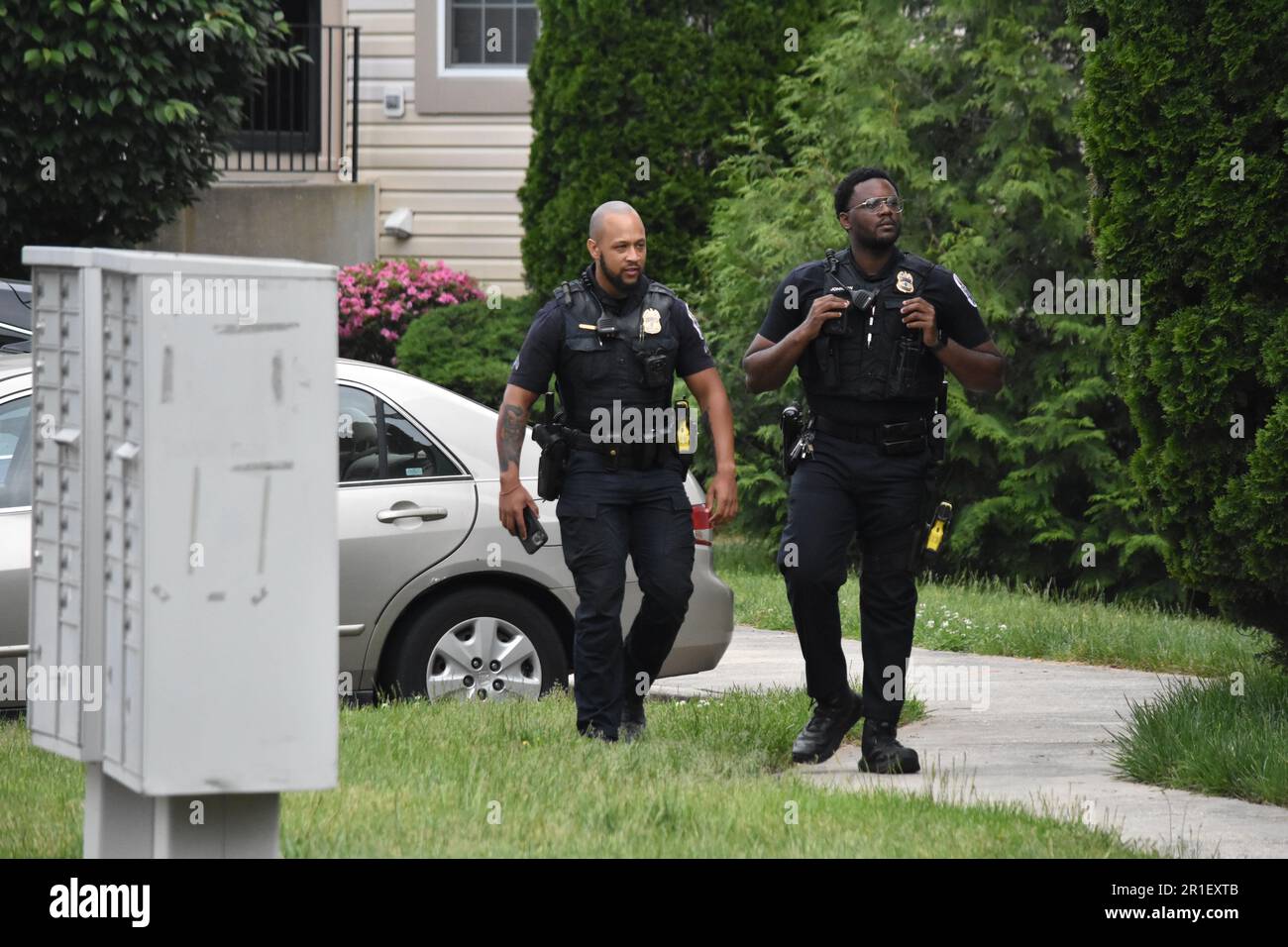 prince-george-s-county-police-officer-s-walk-around-the-area-and-search