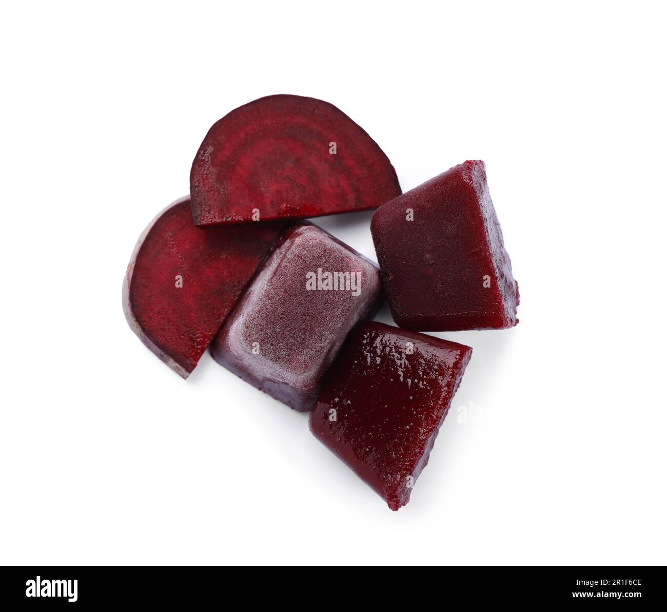 Frozen beetroot puree cubes and fresh beetroot isolated on white, top view Stock Photo