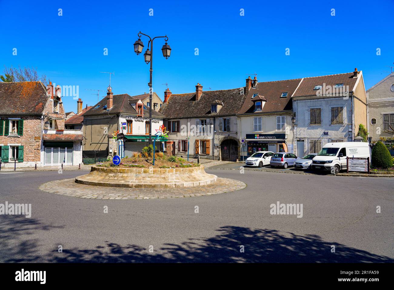 Roundabout in the medieval town of Moret-sur-Loing in Seine et Marne, France Stock Photo
