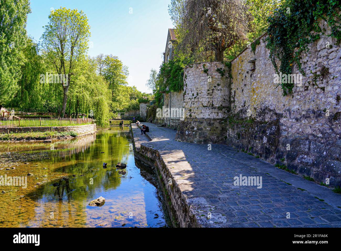 Riverside promenade in the medieval town of Moret-sur-Loing in Seine et Marne, France Stock Photo