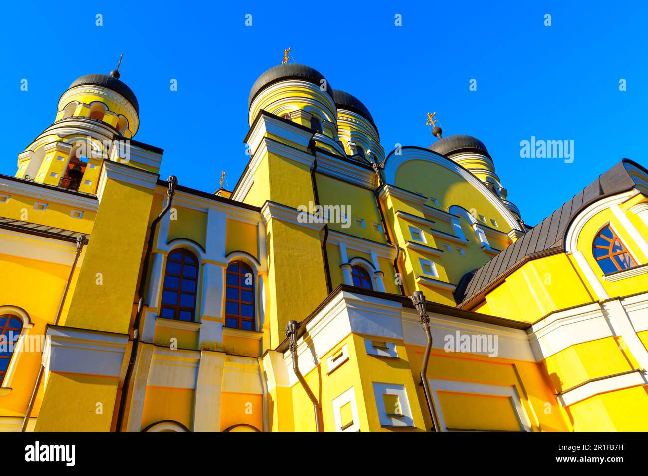 Yellow church with domes . Orthodox place of worship Stock Photo