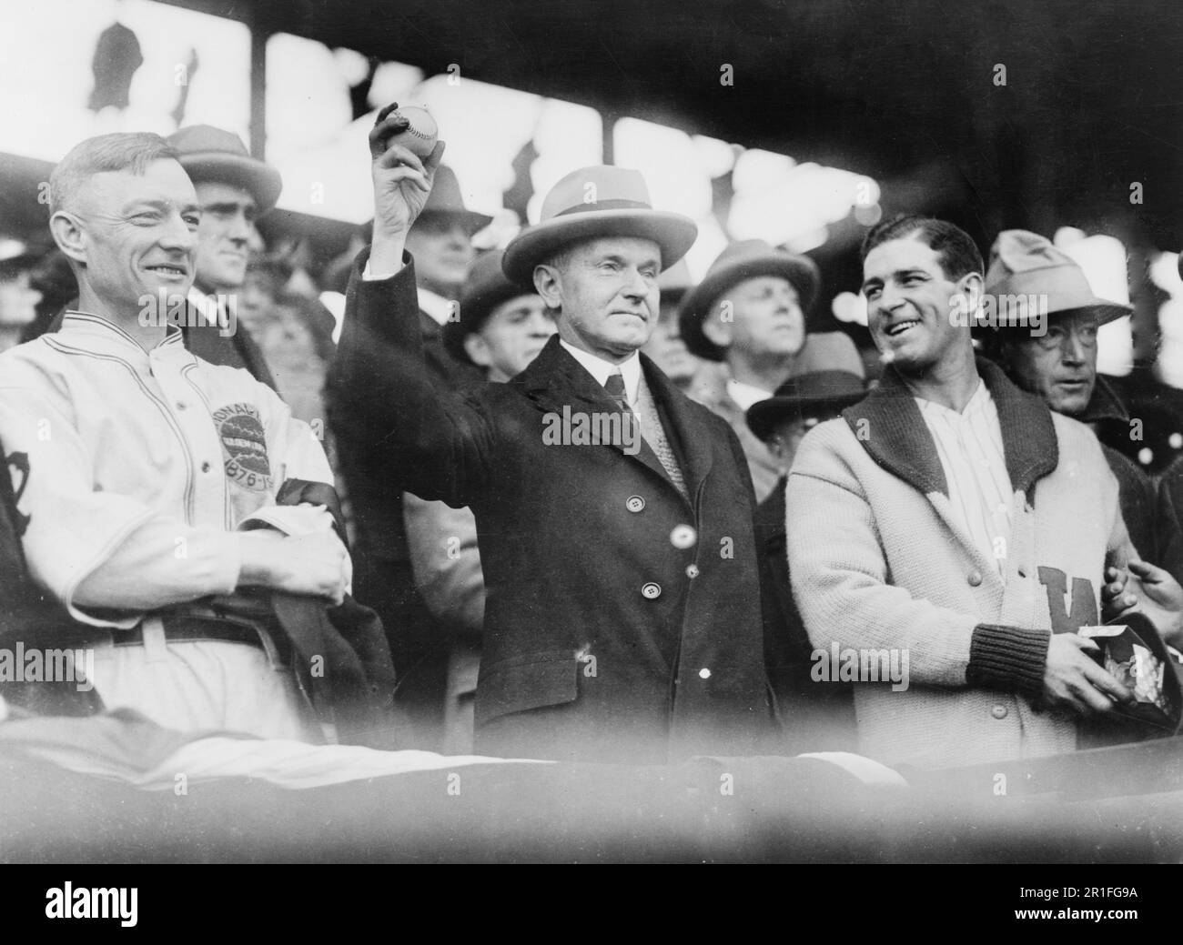 Archival Photo: Calvin Coolidge, half length, standing, facing slightly ...