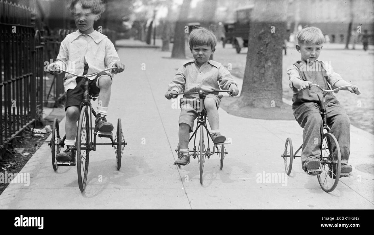 Archival Photo Children having fun riding on tricycles ca. 1910s or