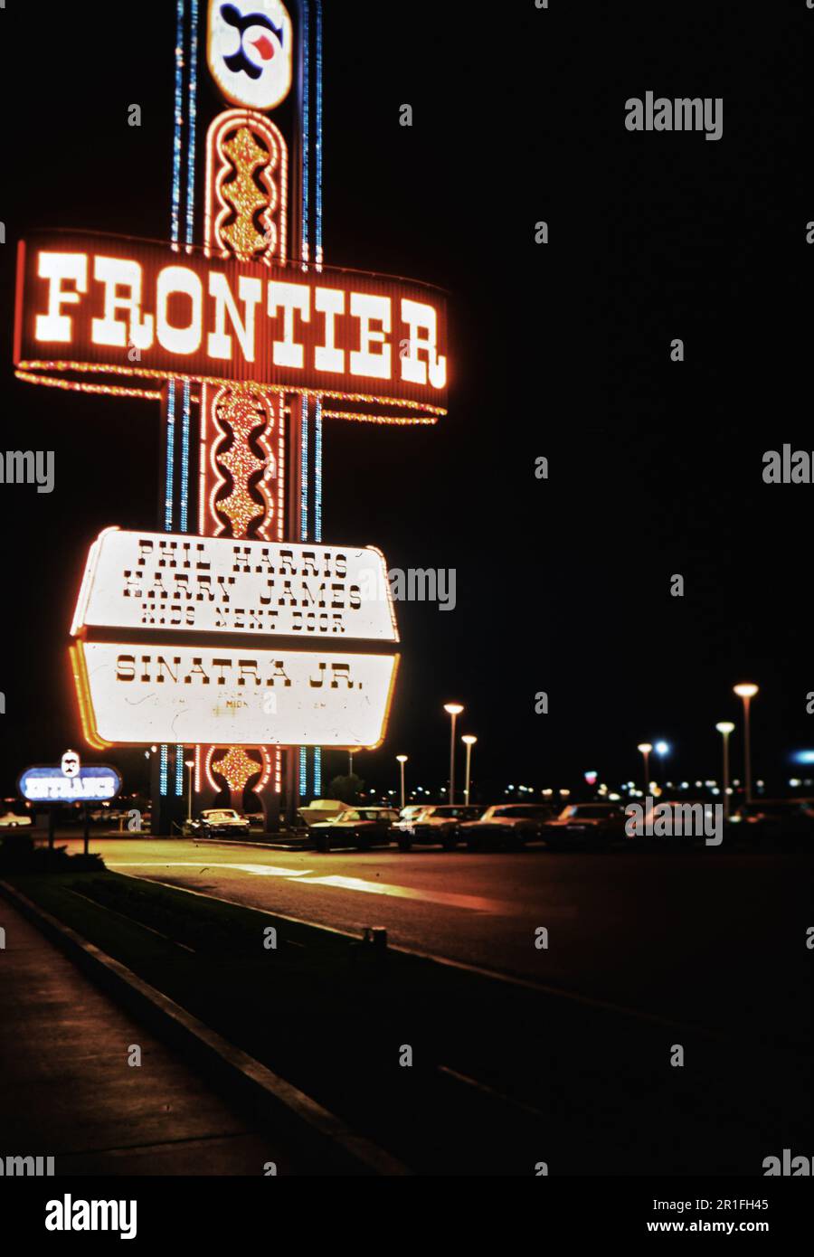 Frontier Hotel in Las Vegas Nevada, sign shows performers at the hotel include Phil Harris, Harry James, Kids Next Door and Frank Sinatra Jr. ca. 1971 Stock Photo