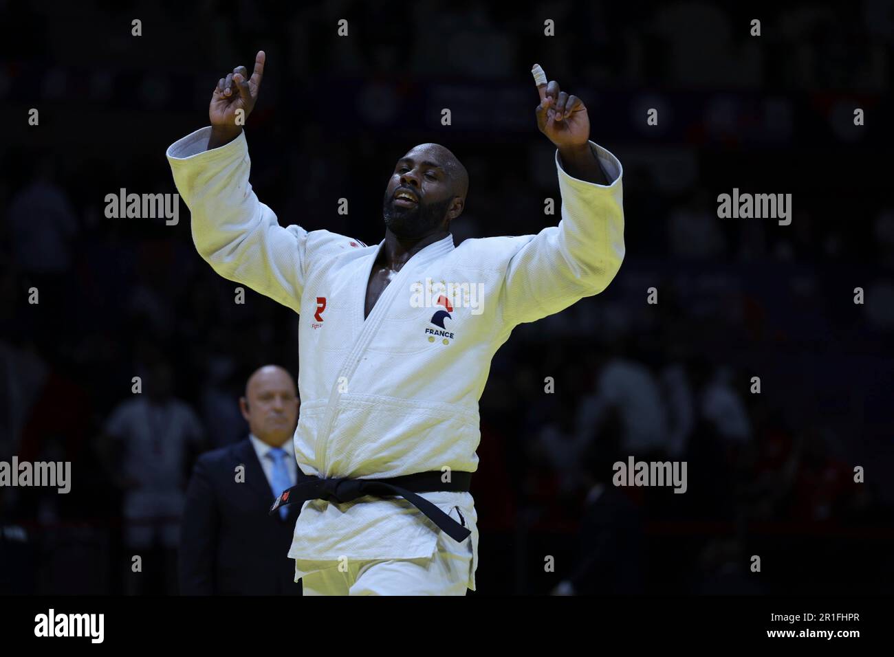 France's Teddy Riner celebrates after winnning the men's +100kg class ...
