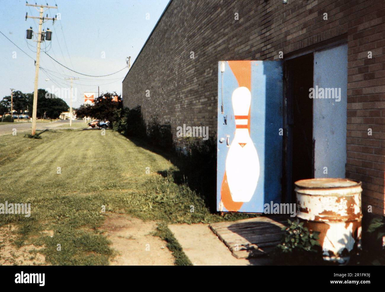 Open back door of a bowling alley in Wisconsin (r) ca. 1985 Stock Photo