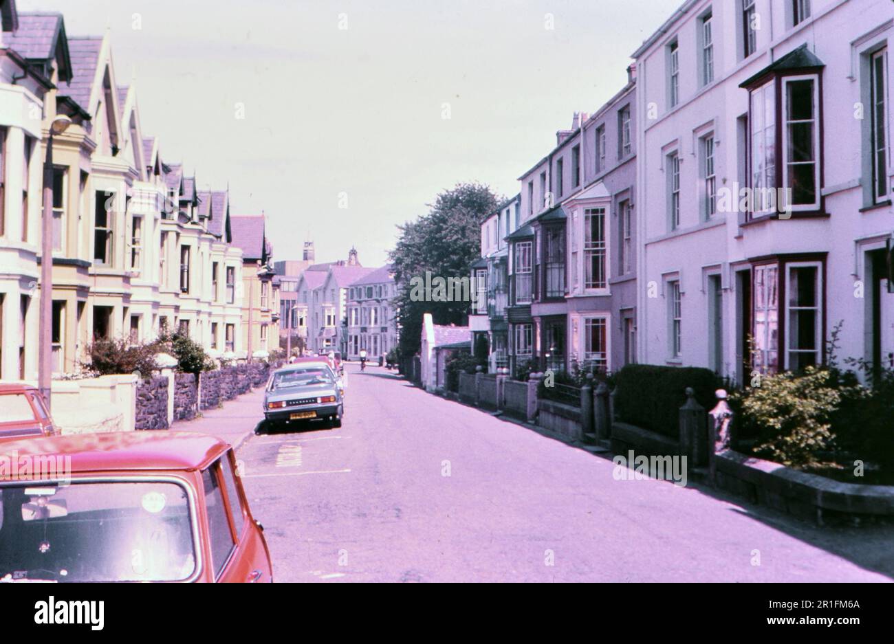 Parked cars on a street in Bangor Wales UK ca. 1981 Stock Photo Alamy