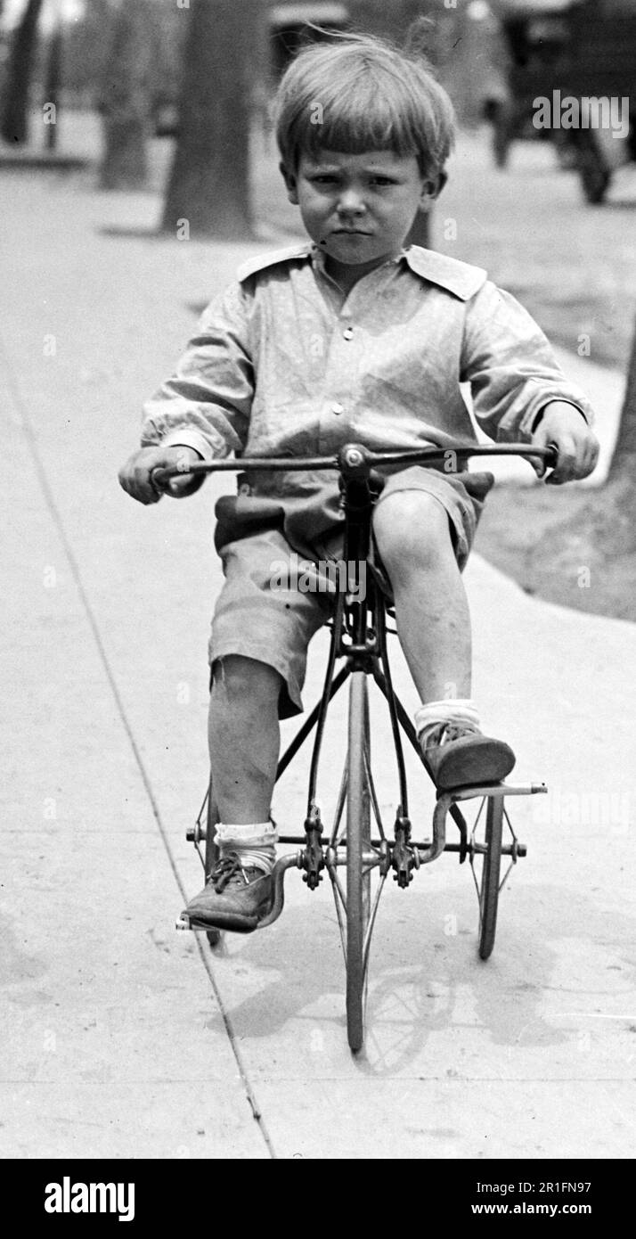 Archival Photo Children having fun riding on tricycles ca. 1910s or