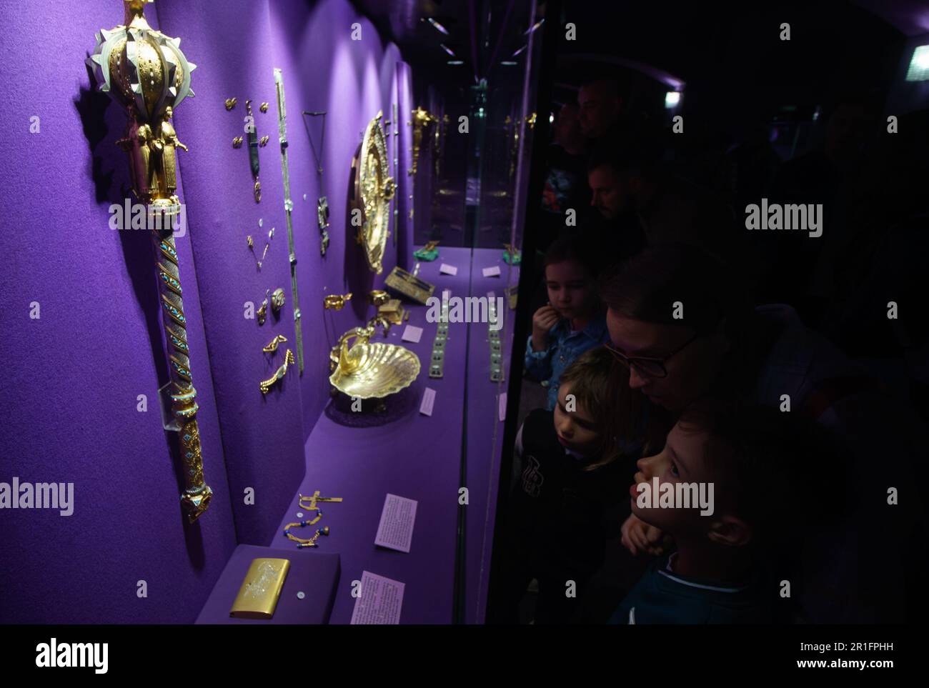 Bucharest, Romania. 13th May, 2023: People look at Princess Maria platter and cup on display in the treasure hall of the National Museum of Romanian History during the Long Night of Museums in Bucharest. Credit: Lucian Alecu/Alamy Live News Stock Photo