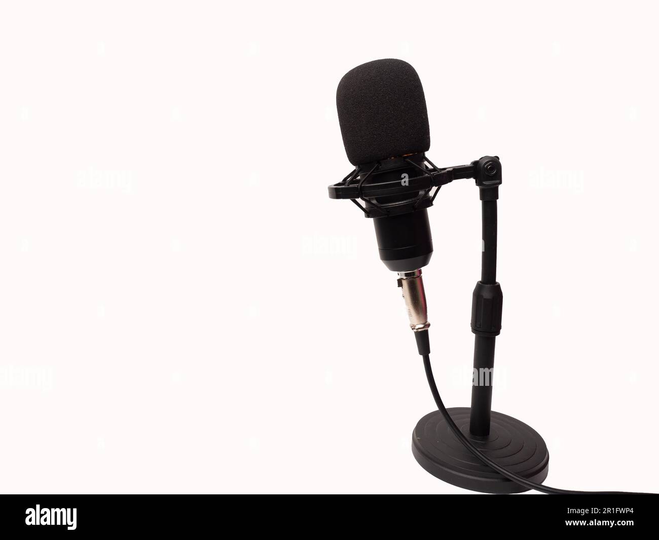 Picture of a black condenser microphone on a white isolated background