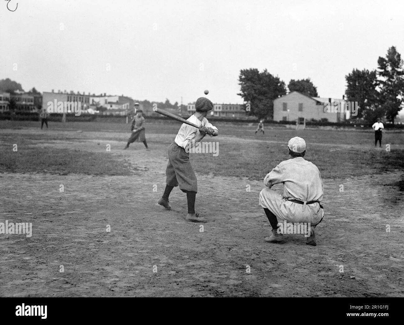 Archival Photo Playground baseball game in 1910s or 1920s Stock Photo