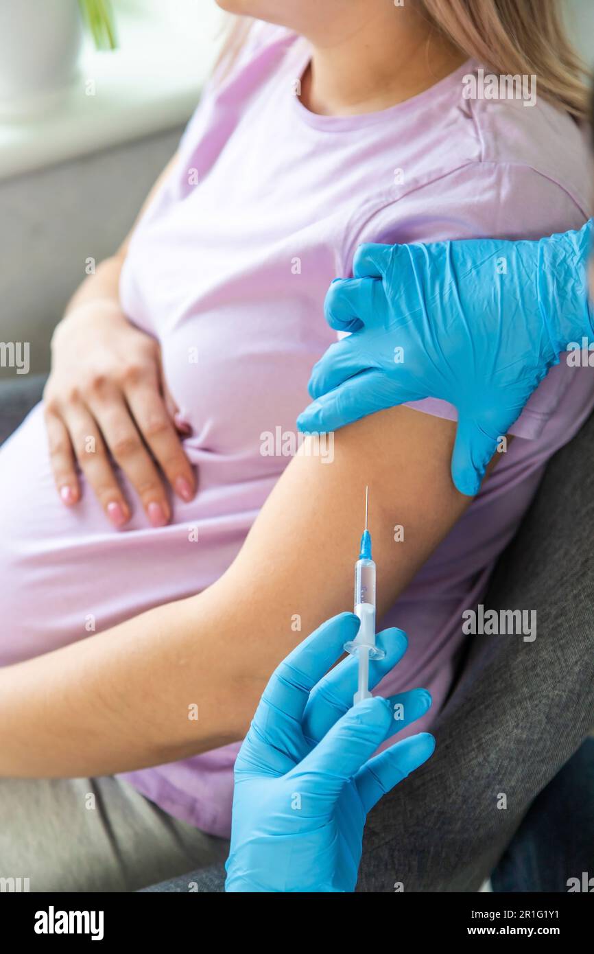 Woman doctor makes injection hi-res stock photography and images - Alamy