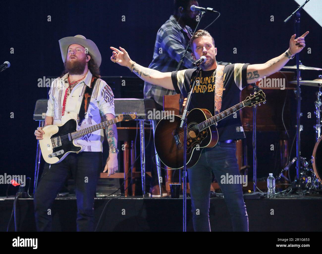 Brothers Osbourne's T.J. Osborne, right, and John Osbourne perform at