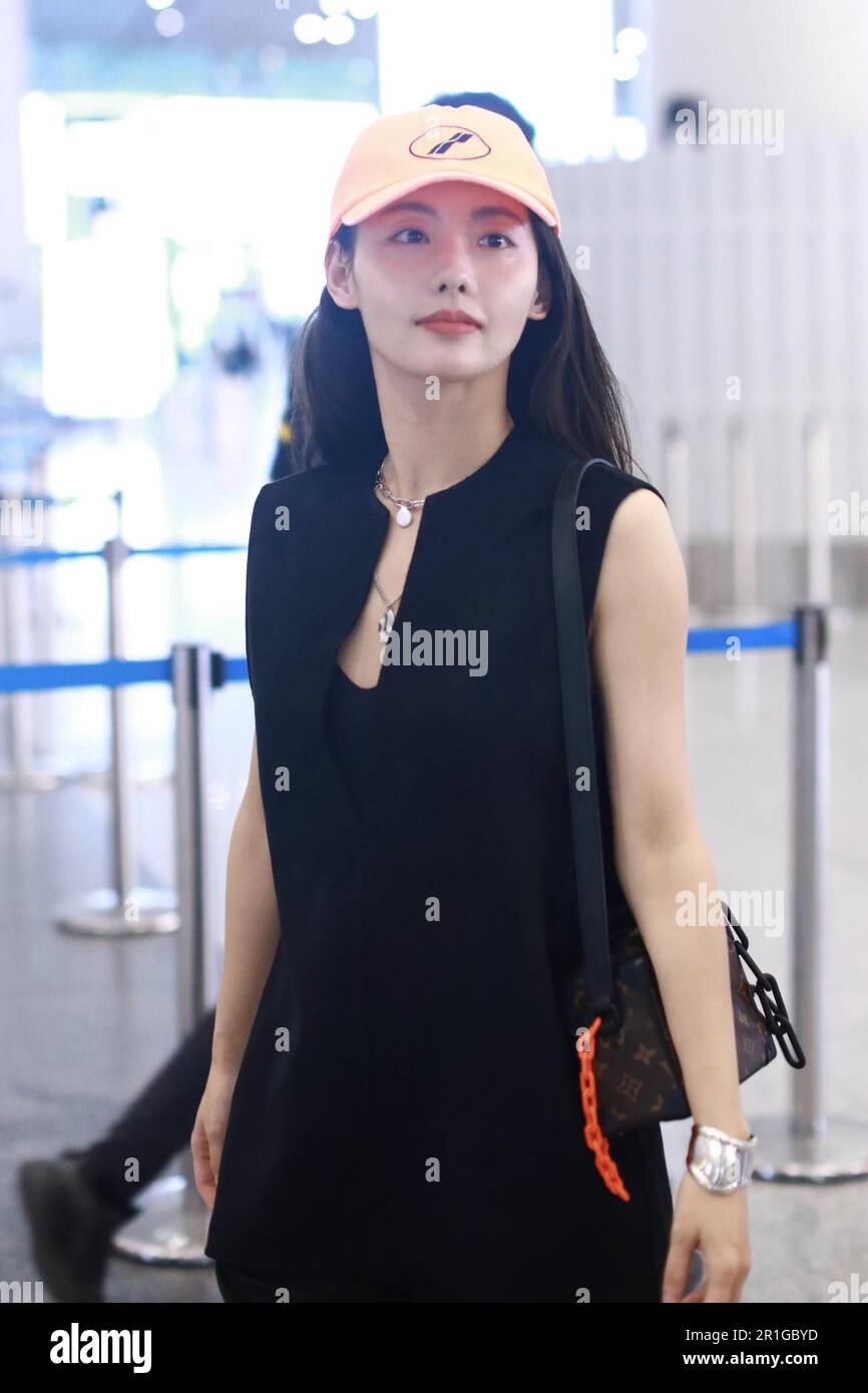 Chinese actress and singer Jenny Zhang appeared at airport in Beijing ...