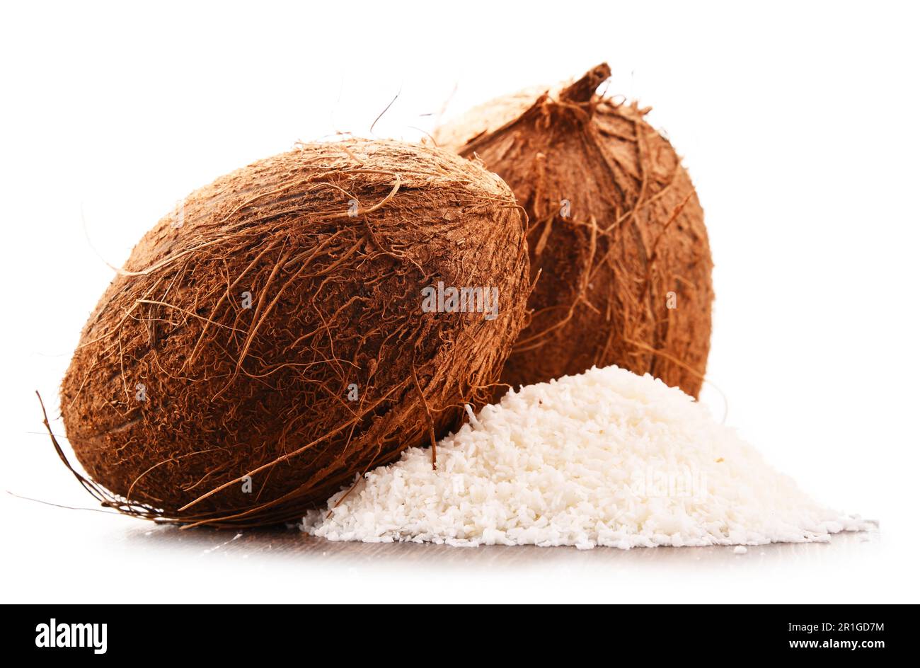 Composition with shredded coconut and shells isolated on white background Stock Photo