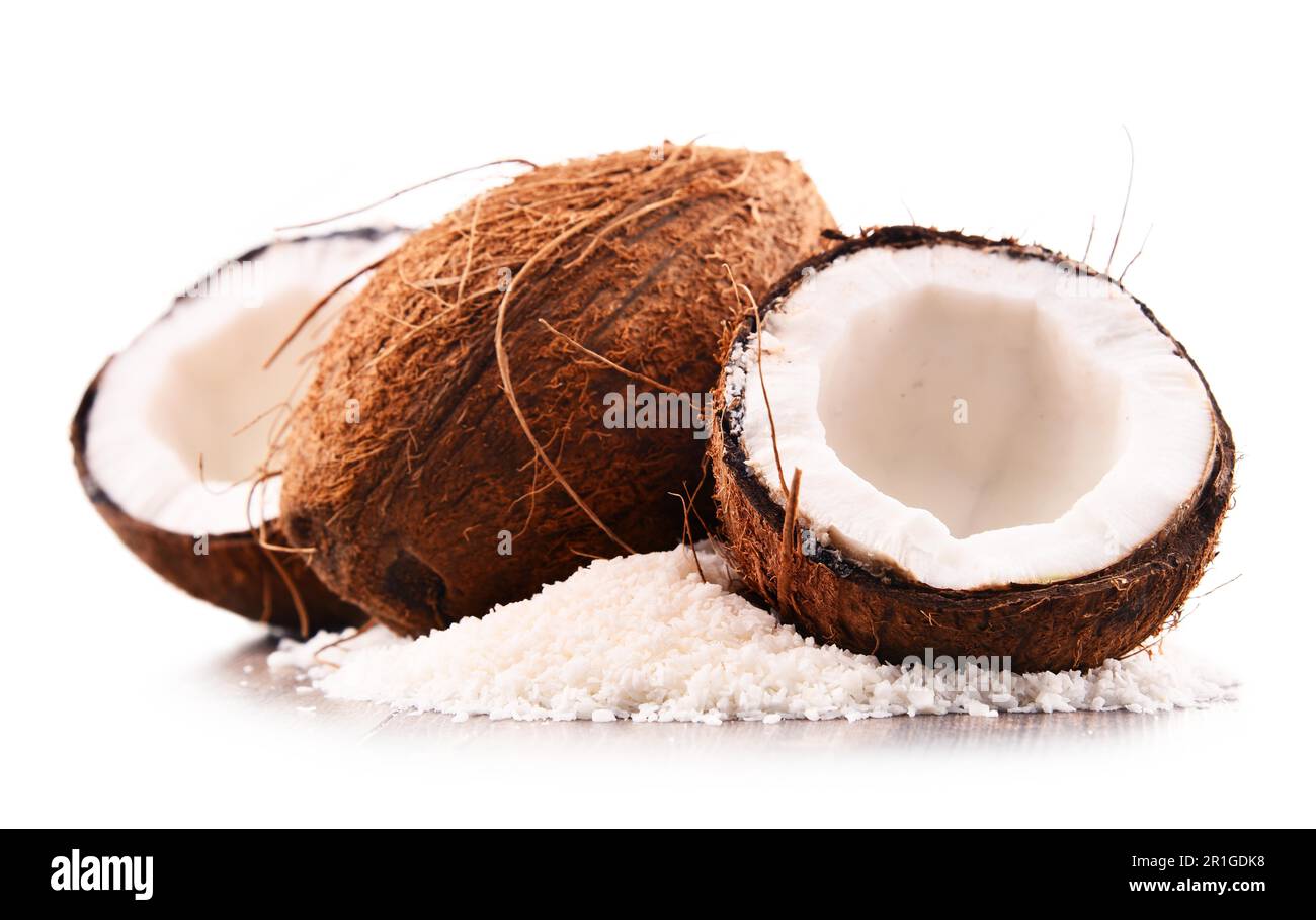Composition with shredded coconut and shells isolated on white background Stock Photo