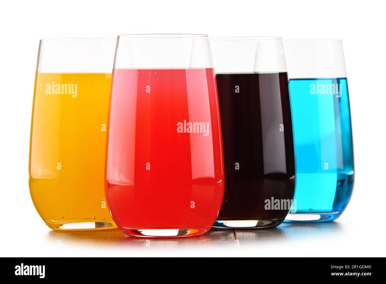 Glasses of assorted carbonated soft drinks isolated on white Stock Photo