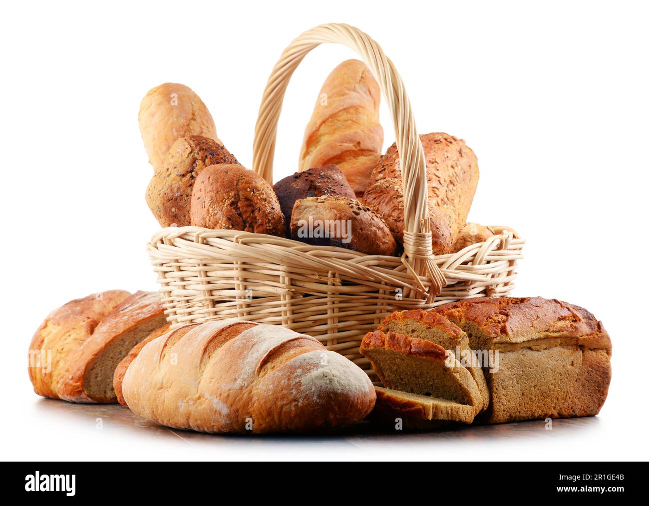 Wicker basket with assorted baking products isolated on white background Stock Photo