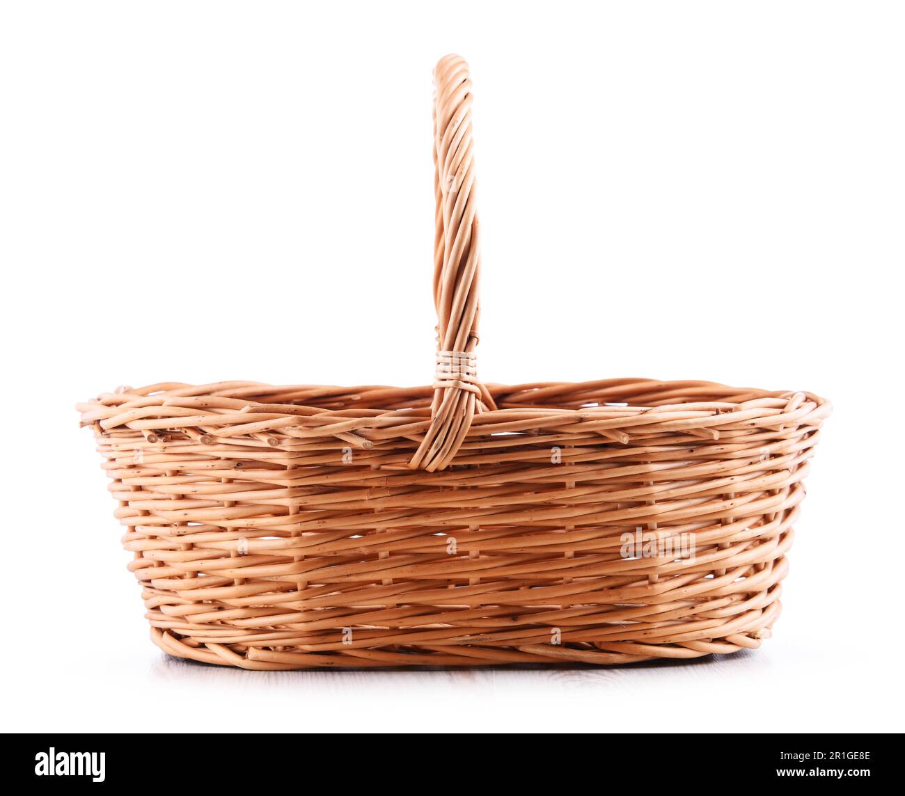 Empty wicker basket isolated on white background Stock Photo - Alamy
