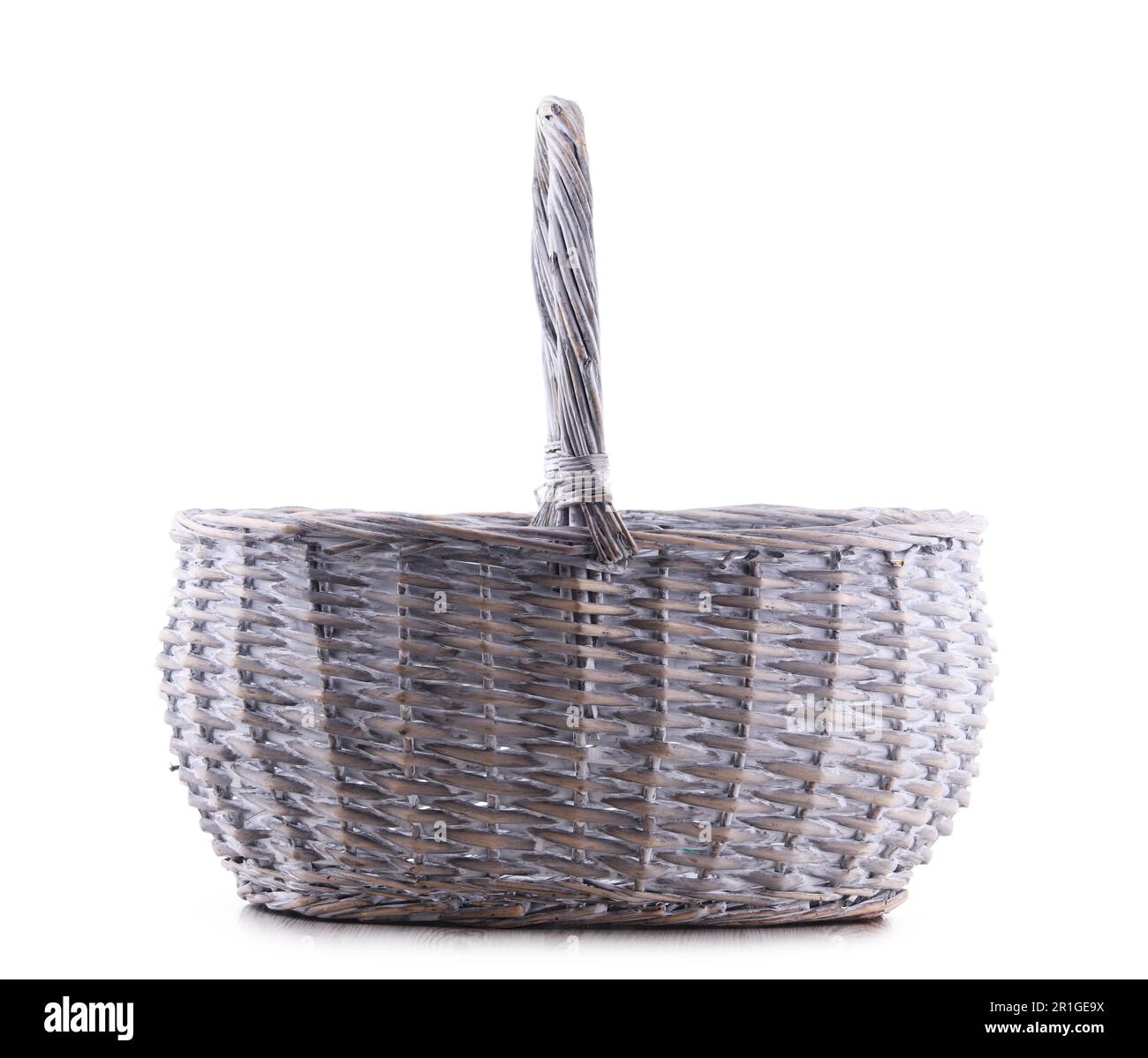 Empty wicker basket isolated on white background Stock Photo - Alamy