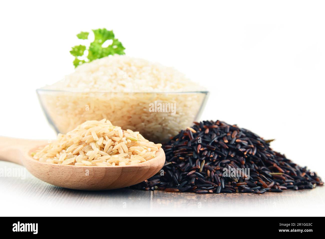 Composition with bowl of rice isolated on white background Stock Photo
