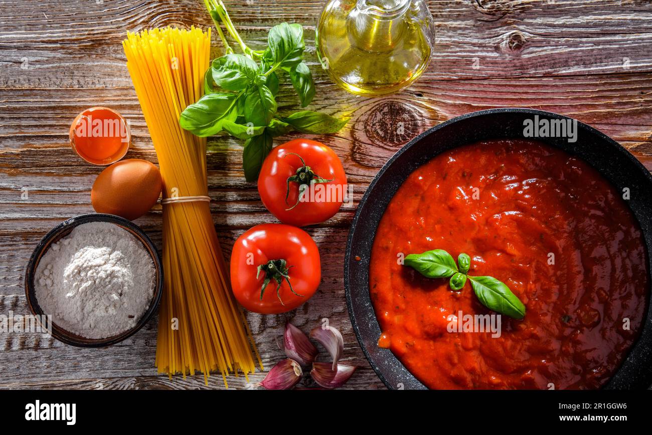Composition with dried spaghetti, and pasta ingredients Stock Photo