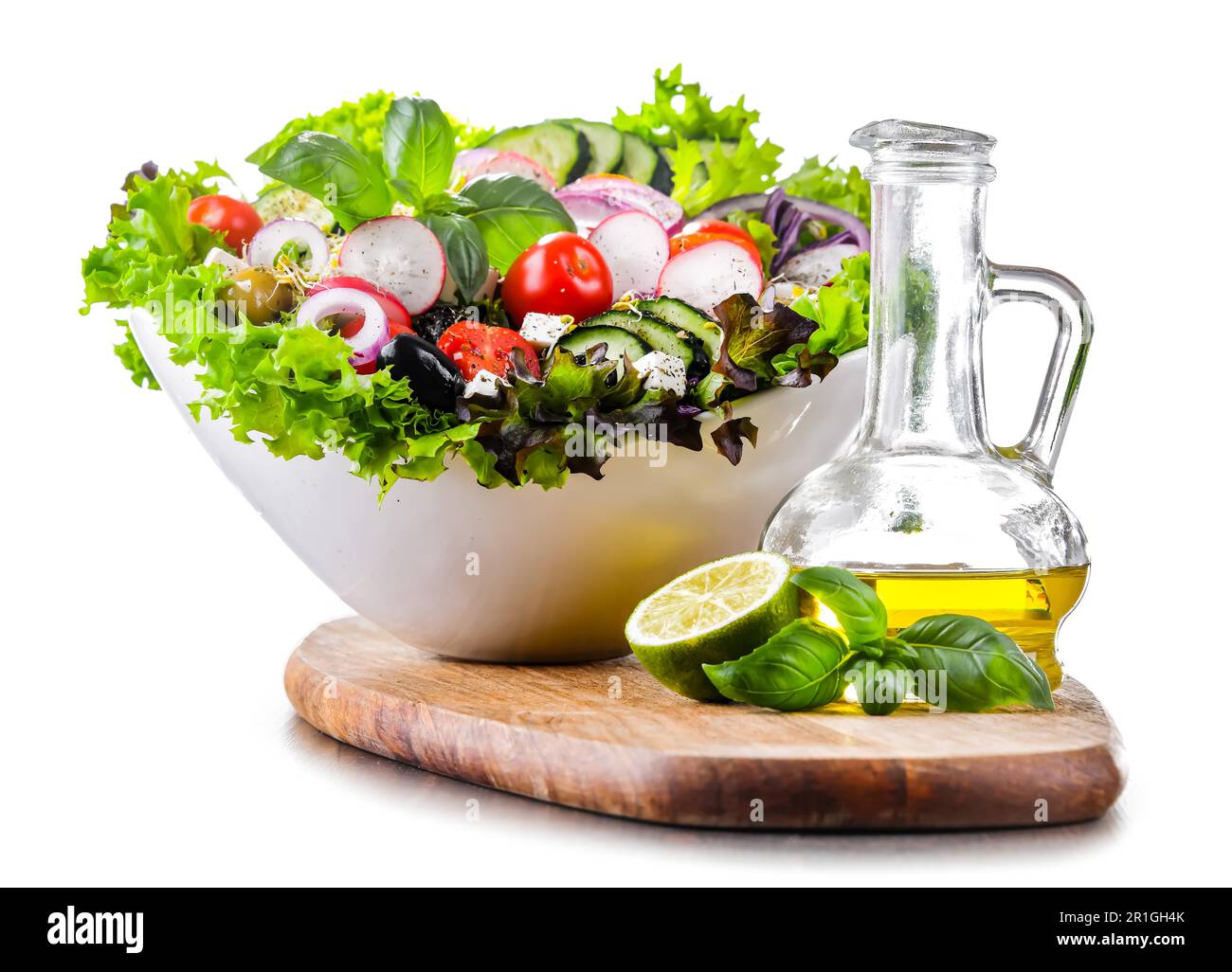 Vegetable salad bowl isolated on white background Stock Photo