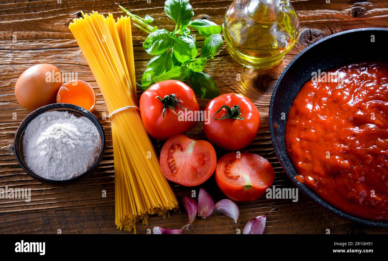 Composition with dried spaghetti, and pasta ingredients Stock Photo