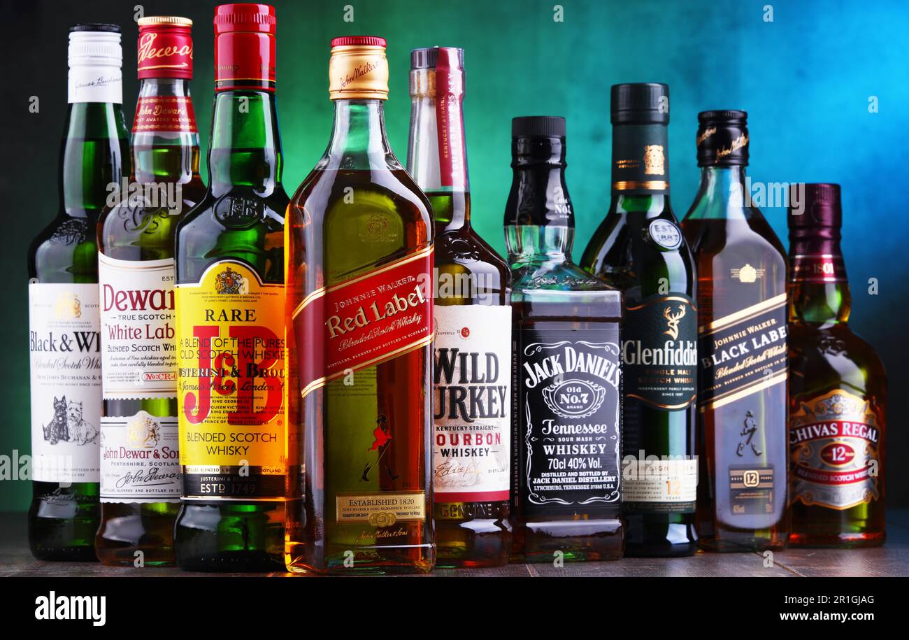 POZNAN, POLAND - NOV 16, 2018: Bottles of several global whiskey brands, the most popular liquor in the world Stock Photo