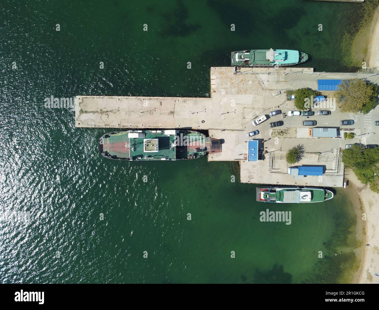 Ferry boat crossing the sea, carrying cars and passengers. Cars drive