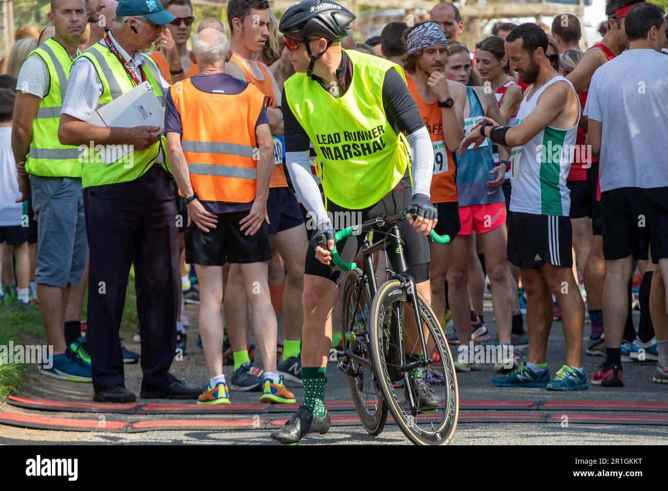 Lead Runner Marshal On A Bicycle At The Start Of The Framlingham Flyers lead-runner-marshal-on-a-bicycle-at-the-start-of-the-framlingham-flyers