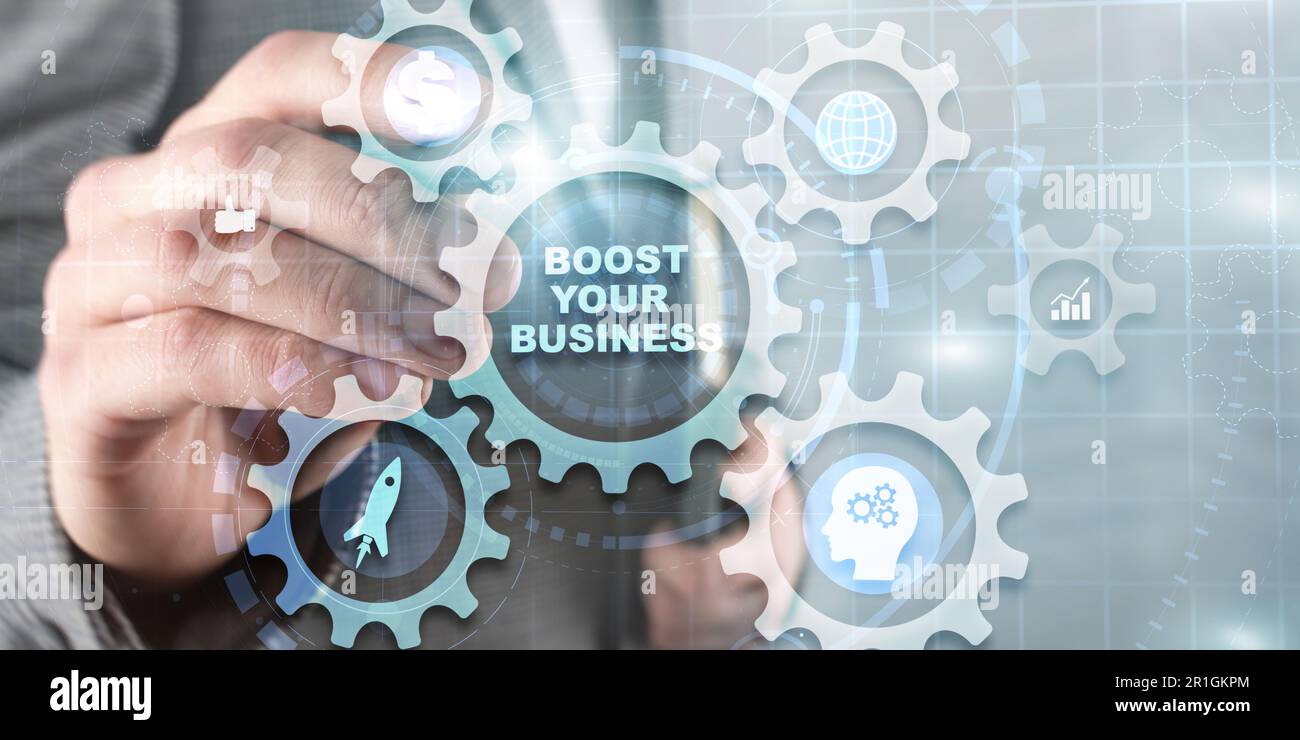 Boost your business on Virtual screen Gears. Business Technology Internet and network concept. Stock Photo