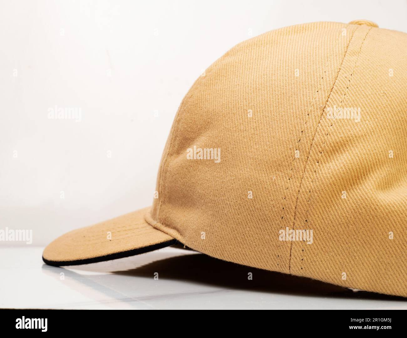 Side view of a brown baseball hat on a white background Stock Photo Alamy