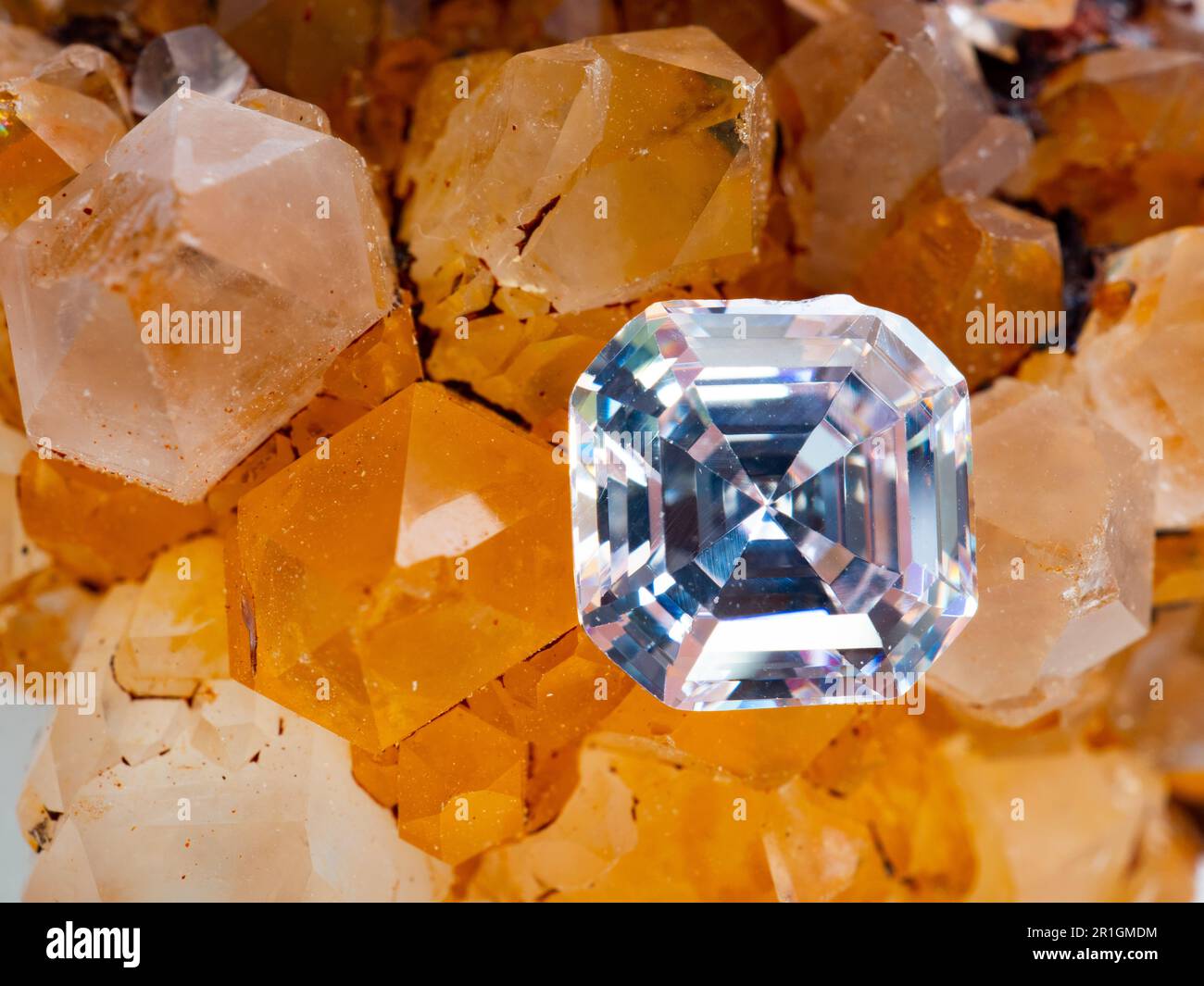Sparkling asscher cut diamond on a rough crystal Stock Photo Alamy