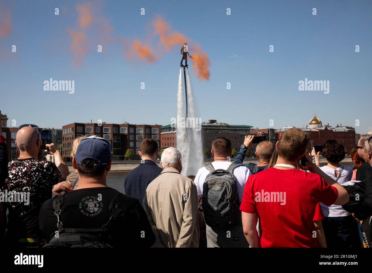 Moscow, Russia. 13th May, 2023. Acrobatics with flyboard during marking the Motoseason opening on Crimea embankment in Muzeon Park in Moscow, Russia Stock Photo