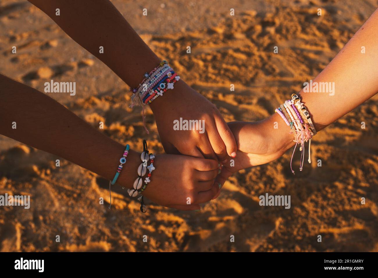 Girls wearing bracelets hi-res stock photography and images - Alamy