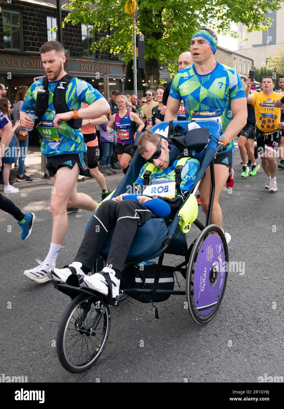 Rob Burrow and Kevin Sinfield during the 2023 Rob Burrow Leeds Marathon starting and finishing