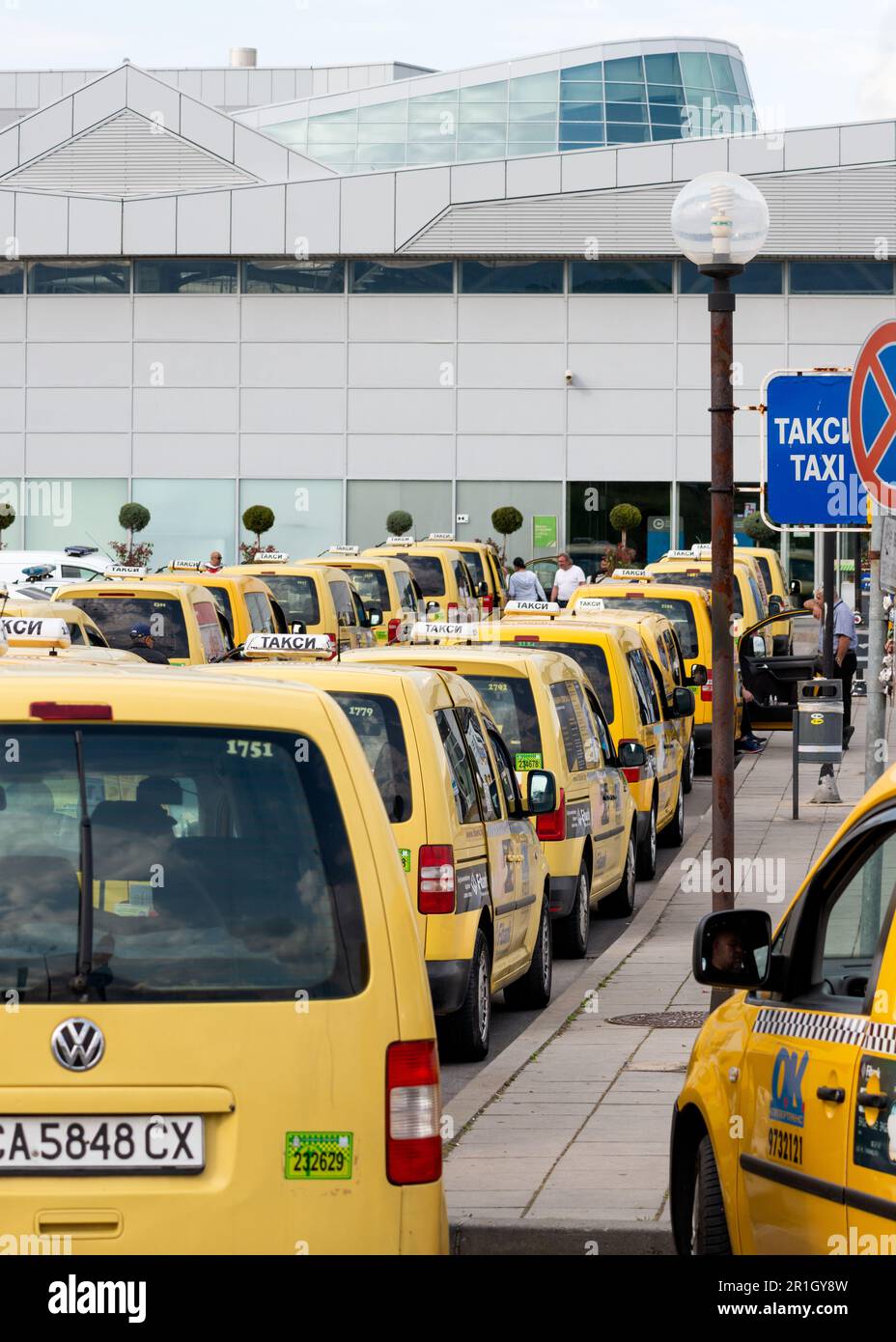 Sofia Airport Terminal 2 taxi rank and taxi cabs queueing, Sofia, Bulgaria, Eastern Europe, Balkans, EU Stock Photo