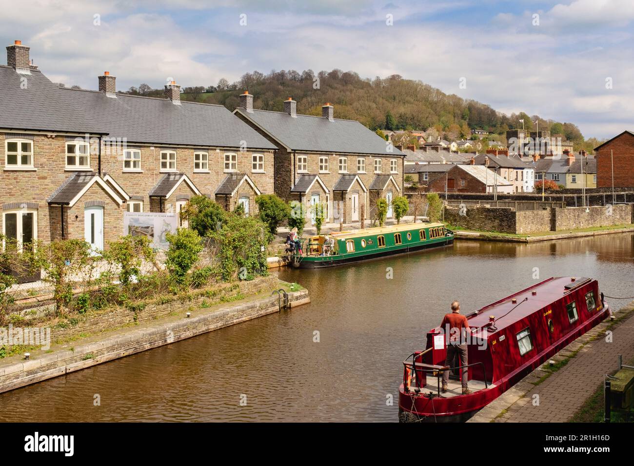 New houses being built beside Monmouthshire and Brecon Canal basin in Brecon (Aberhonddu), Powys, Wales, UK, Britain Stock Photo