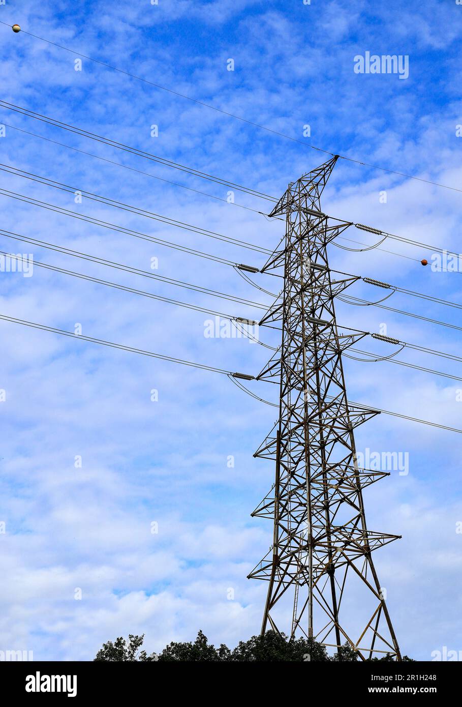 Hight voltage electric towers or pole with blue sky in cloudy day, Landscape pattern. Stock Photo